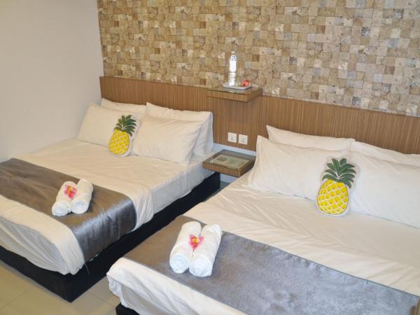 Teruntum 96 Guest house : photo 1 de la chambre chambre double deluxe