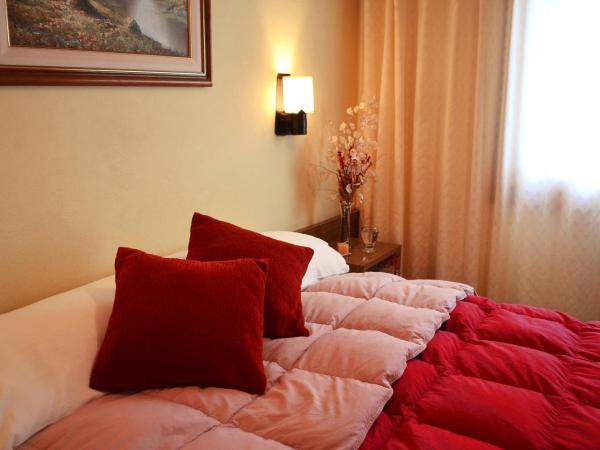 Hostería Güemes : photo 5 de la chambre chambre double ou lits jumeaux