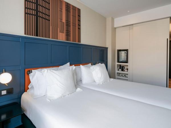 Vincci Consulado de Bilbao : photo 5 de la chambre chambre double ou lits jumeaux - vue sur rivière