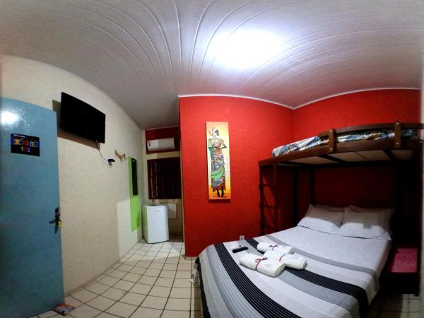 Hostel Cores do Pelô : photo 1 de la chambre triple room with air conditioned