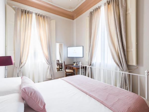 Villa Savioli Room & Breakfast : photo 3 de la chambre chambre supérieure lit queen-size