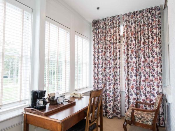 Fort Harrison State Park Inn : photo 3 de la chambre chambre lit king-size deluxe