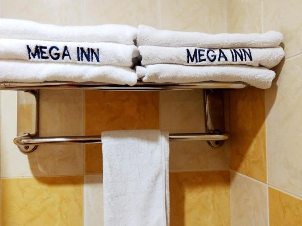 Megah Inn : photo 5 de la chambre chambre lits jumeaux standard