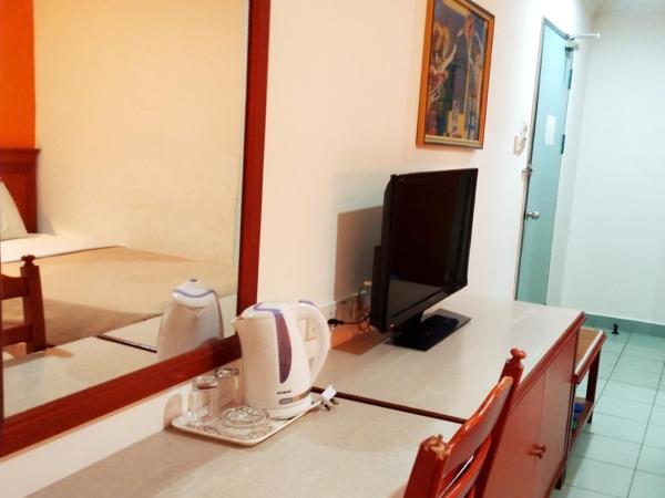 Megah Inn : photo 2 de la chambre chambre lits jumeaux standard