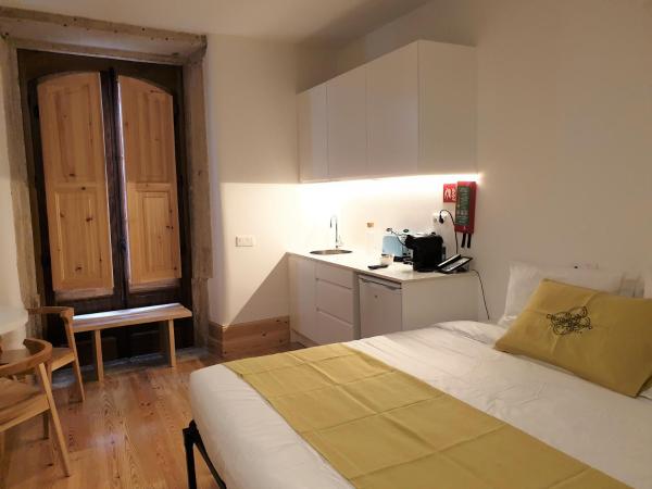 Casa da Baixa Downtown House : photo 4 de la chambre chambre familiale avec balcon