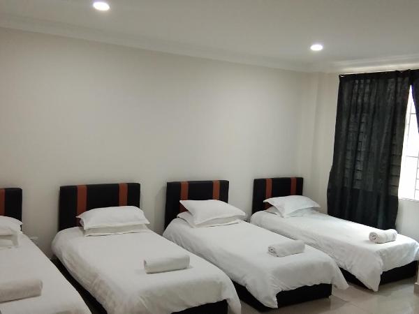 Hotel Mutiara KGMMB : photo 4 de la chambre chambre quadruple supérieure 