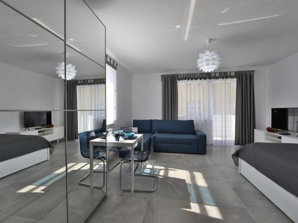 Apartamenty BLIŻEJ MORZA Siłownia i Taras Widokowy Kołobrzeg by Noclegi Renters : photo 1 de la chambre studio