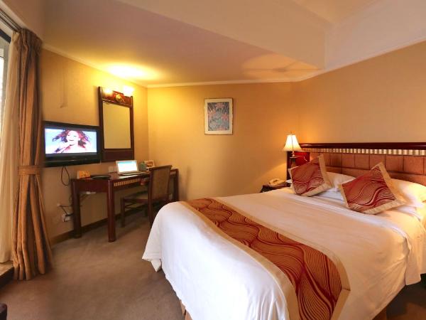 Huiquan Dynasty Hotel Qingdao : photo 2 de la chambre chambre familiale - vue sur mer