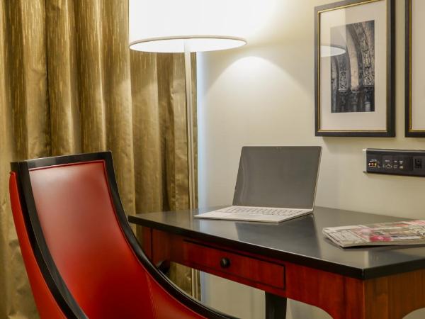 Club Donatello : photo 8 de la chambre chambre lit king-size deluxe