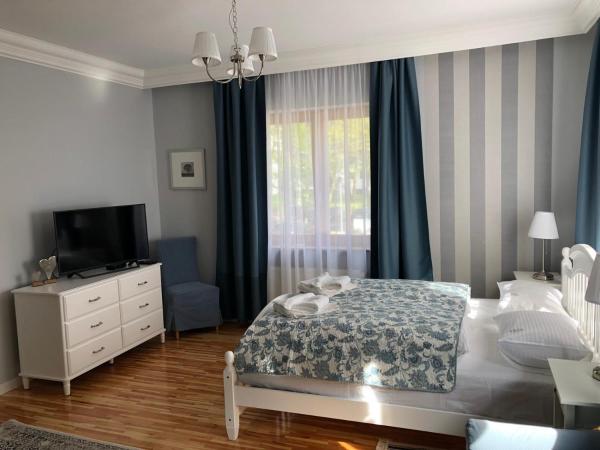 Willa 4 Pory Roku & Uznam : photo 7 de la chambre chambre double deluxe