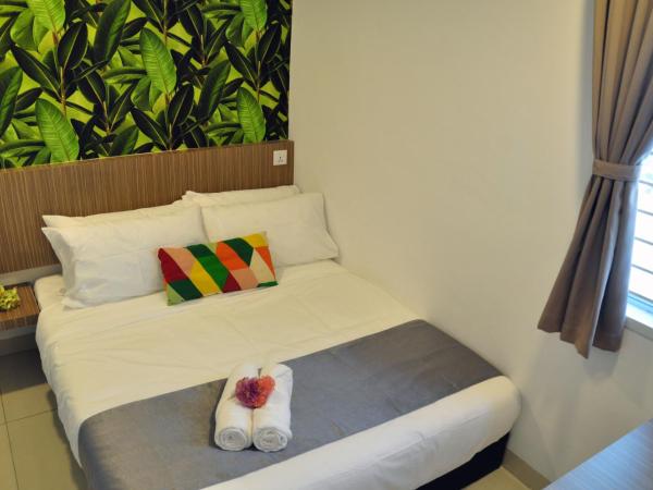 Teruntum 96 Guest house : photo 1 de la chambre chambre lits jumeaux deluxe