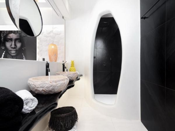 Portara Seaside Luxury Suites : photo 5 de la chambre appartement deluxe avec jacuzzi - vue sur la ville