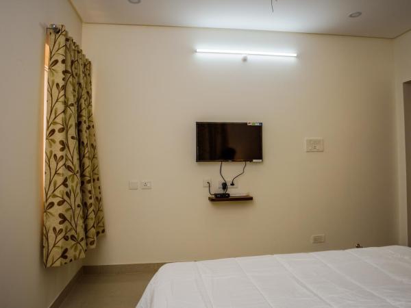 Cloud9Homes Serviced Apartments : photo 1 de la chambre chambre lit queen-size