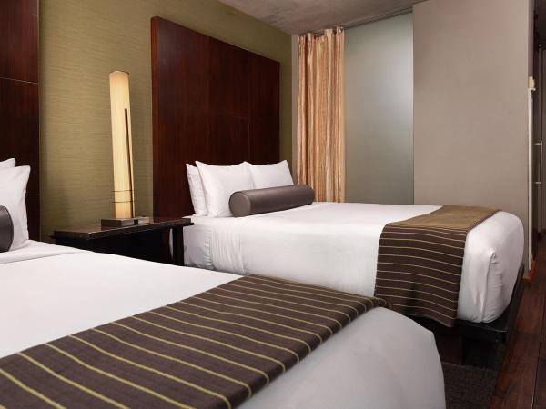 Eurostars Magnificent Mile : photo 2 de la chambre chambre deluxe avec 2 lits doubles