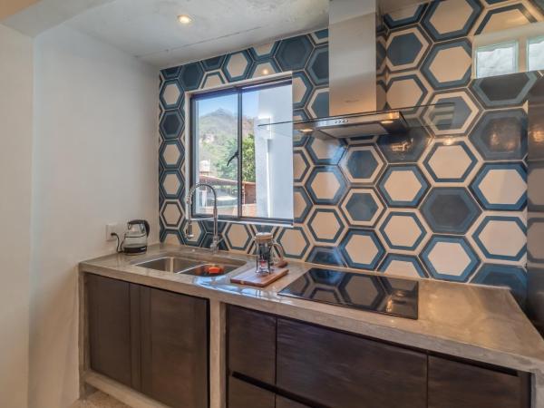 Cuale : photo 7 de la chambre appartement avec balcon