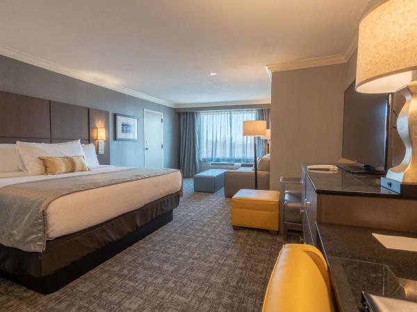 Best Western Premier Airport/Expo Center Hotel : photo 1 de la chambre suite lit king-size avec canapé-lit