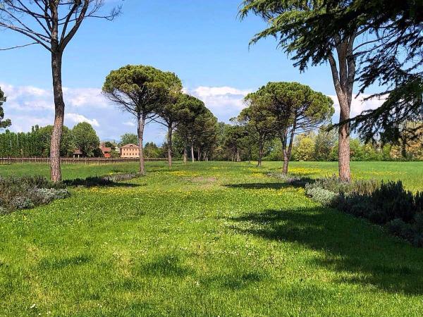 Foresteria Di Villa Tiepolo Passi : photo 6 de la chambre chambre double ou lits jumeaux - vue sur jardin