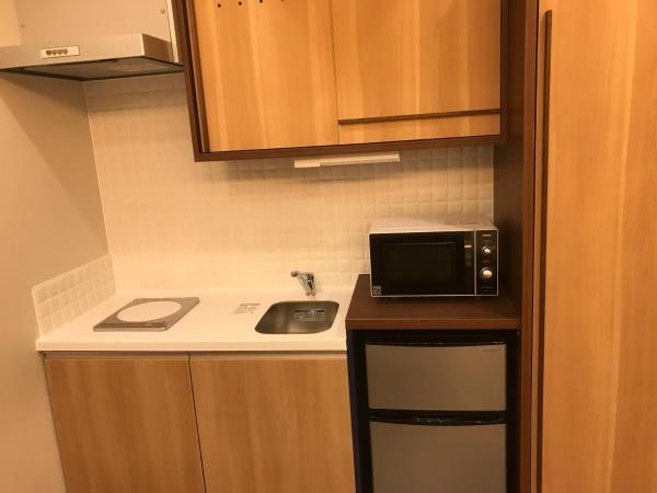 Hotel Yururito Osaka : photo 1 de la chambre chambre quadruple avec baignoire