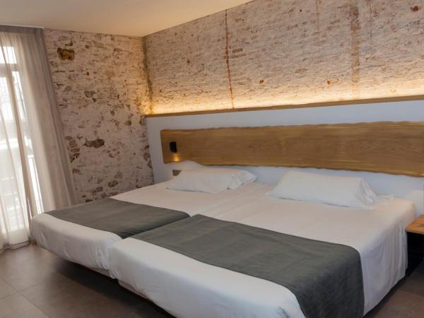 Hostal Paris : photo 7 de la chambre chambre quadruple