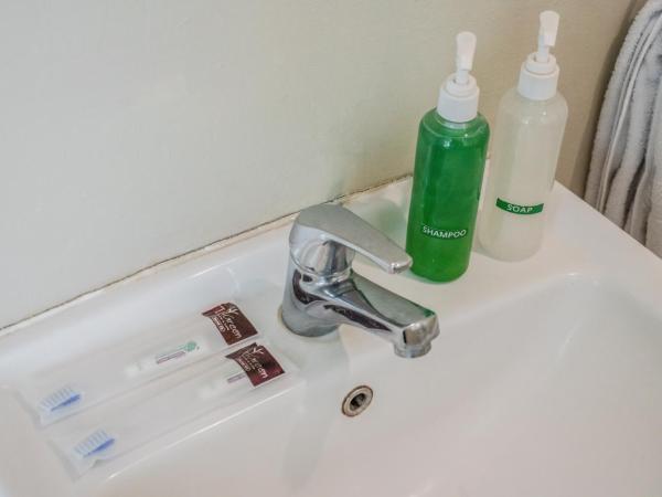 LeGreen Suite Tebet : photo 4 de la chambre chambre double standard