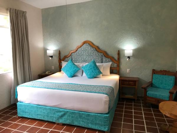 Hotel Posada Quinta Las Flores : photo 1 de la chambre suite junior lit queen-size