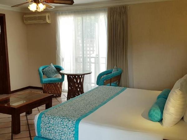 Hotel Posada Quinta Las Flores : photo 4 de la chambre suite lit king-size