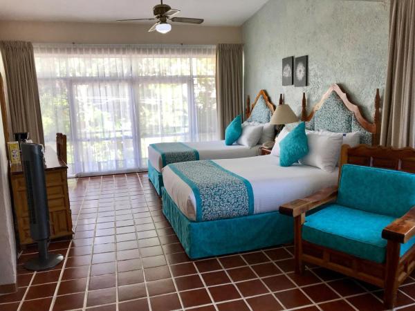 Hotel Posada Quinta Las Flores : photo 2 de la chambre suite double junior