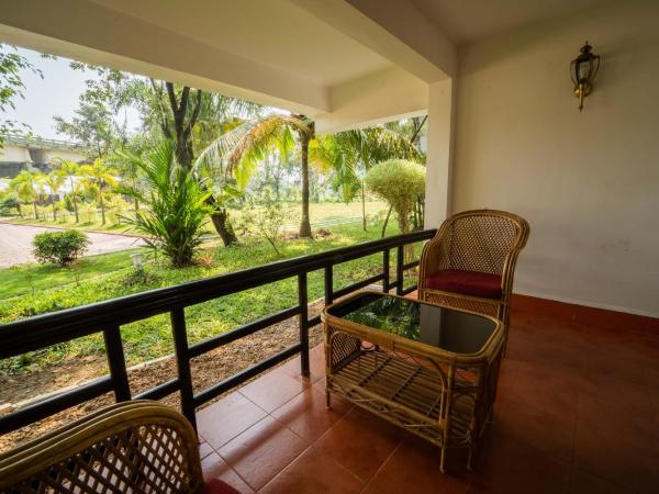 Nihara Resort and Spa Cochin : photo 2 de la chambre cottage
