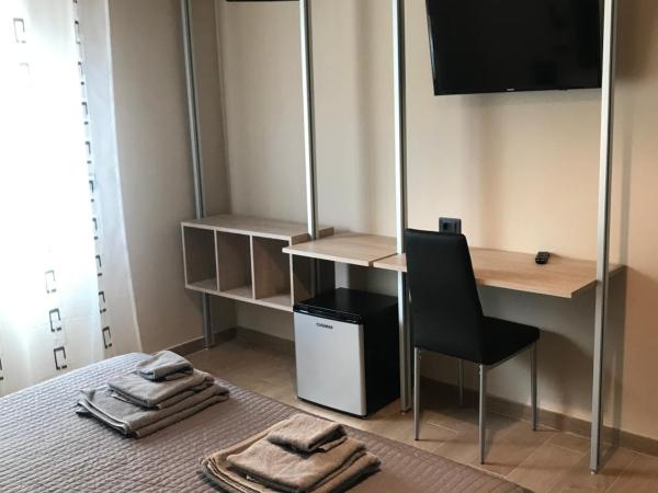 Riva Reno 4 Rooms : photo 2 de la chambre chambre quadruple