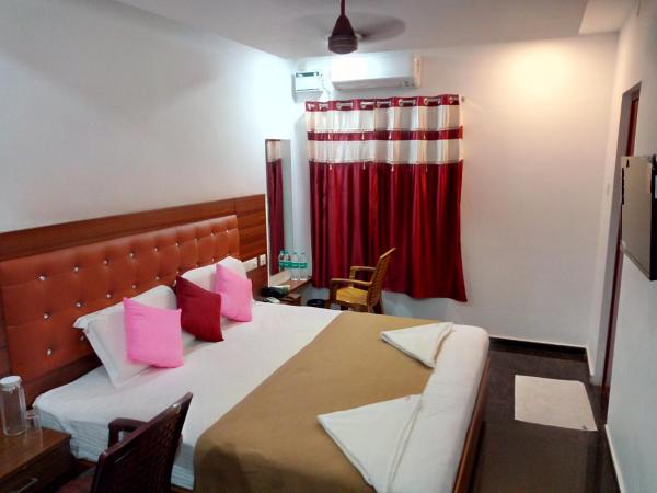 Medavakkam Sri Sai Residency : photo 7 de la chambre chambre deluxe
