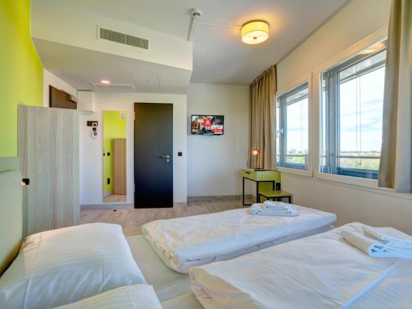 MEININGER Hotel München Olympiapark : photo 1 de la chambre chambre double pour occupation simple