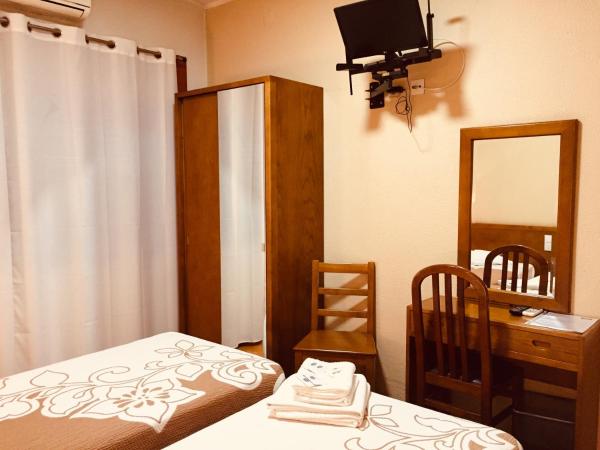 Hotel Portinari : photo 4 de la chambre chambre lits jumeaux