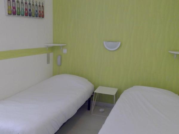 Htel Central : photo 7 de la chambre chambre lits jumeaux