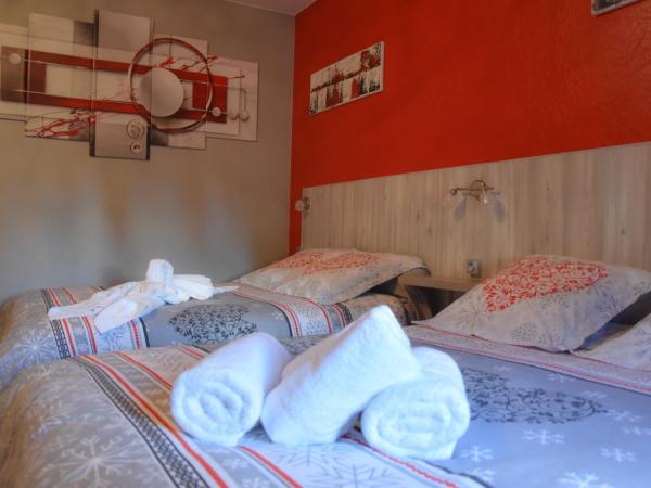Hotel des Remparts : photo 8 de la chambre chambre quadruple