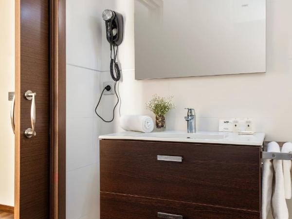 Hotel de Francia y París : photo 4 de la chambre chambre lits jumeaux