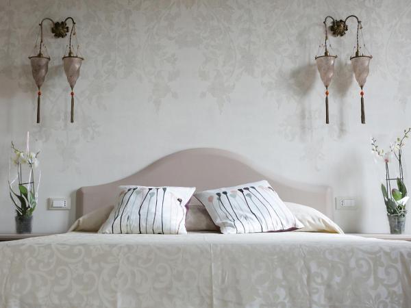 Guest House Ca' dell'Angelo : photo 1 de la chambre chambre quadruple supérieure avec salle de bains privative