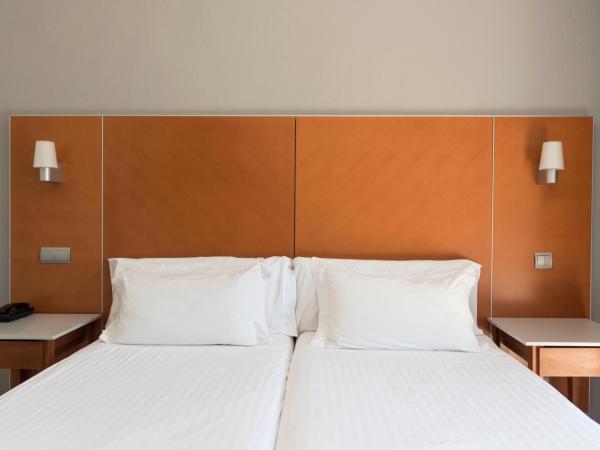 Hotel El Palmeral : photo 6 de la chambre chambre double ou lits jumeaux