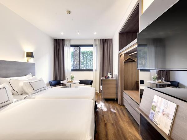 Melia Madrid Serrano : photo 1 de la chambre chambre double ou lits jumeaux standard