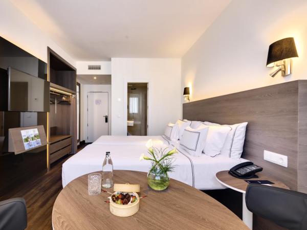 Melia Madrid Serrano : photo 5 de la chambre chambre double ou lits jumeaux premium