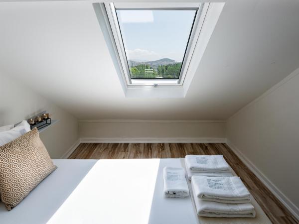 JR Studios & Suites I Rius I : photo 4 de la chambre chambre double - mansardée