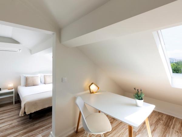 JR Studios & Suites I Rius I : photo 2 de la chambre chambre double - mansardée