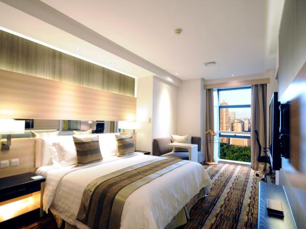 Gubei Garden Hotel Shanghai Hongqiao : photo 1 de la chambre chambre lit king-size - vue sur jardin