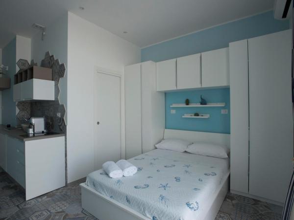 Nereidi Suites : photo 9 de la chambre chambre double deluxe avec balcon - vue sur mer
