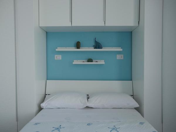 Nereidi Suites : photo 10 de la chambre chambre double deluxe avec balcon - vue sur mer