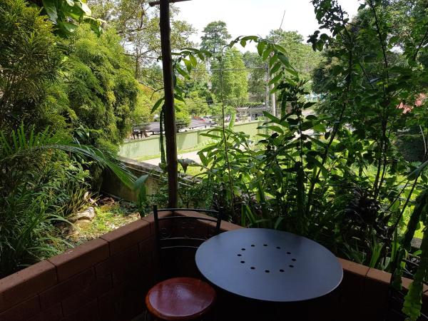 Rock Inn Bailan : photo 1 de la chambre bungalow avec terrasse