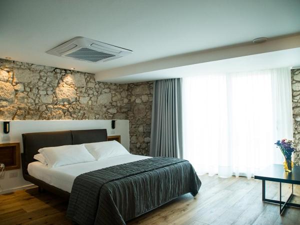 Re Dionisio Luxury Suites : photo 1 de la chambre suite junior