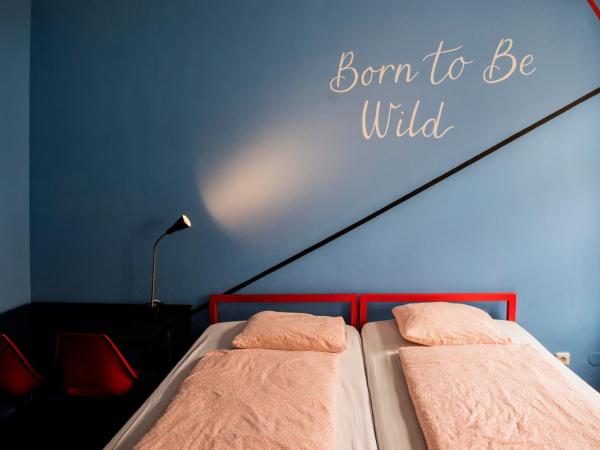 Hostel Eleven : photo 7 de la chambre chambre double ou lits jumeaux avec salle de bains commune