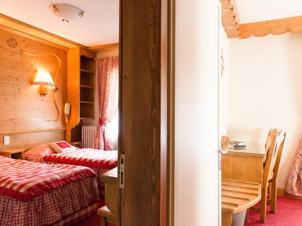 Hôtel Le Sporting : photo 2 de la chambre chambre familiale (2 adultes et 2 enfants)