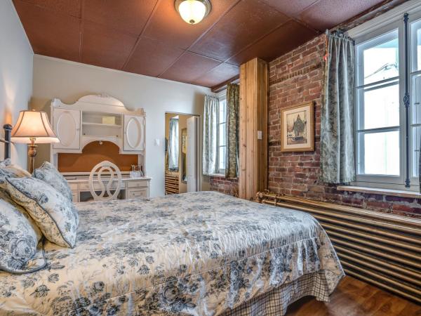 Manoir Sur le Cap : photo 1 de la chambre chambre double avec 2 lits doubles