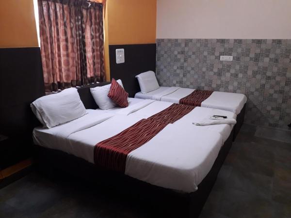 Season 4 Residences -Thiruvanmiyur Near Tidel park Apollo Proton cancer center and IIT Madras Research Park : photo 8 de la chambre chambre familiale deluxe